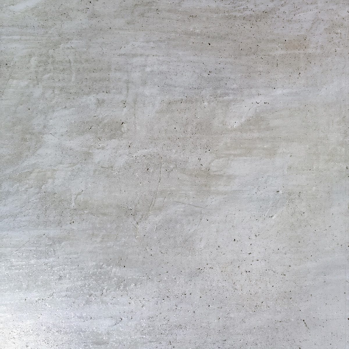 Detailaufnahme einer roh-mineralischen Industrie-Estrich-Oberfläche